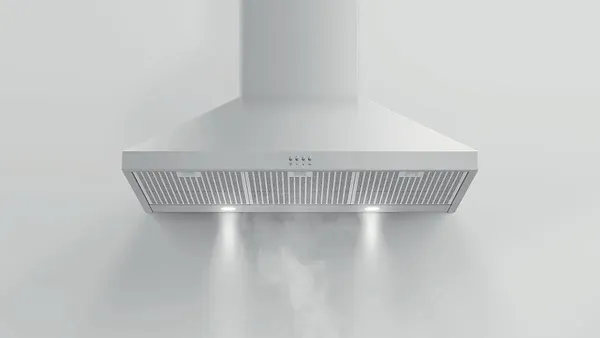 The Fisher & Paykel HC36PCX1 range hood filtering smoke from the air 