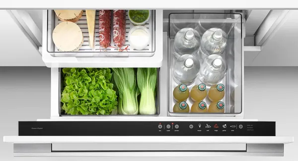 An overhead view of the Fisher & Paykel RB36S25MKIW N 1 drawer refrigerator stocked with food and beverages