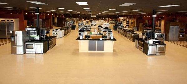 Various appliances inside a Fred’s Appliance showroom 