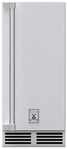 front view of a silver hestan ice maker with long handle on the left of machine