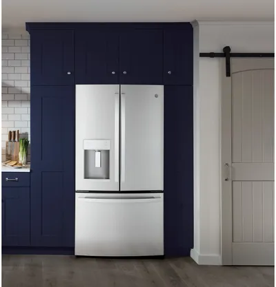 The GE GYE22GYNFS refrigerator in a kitchen