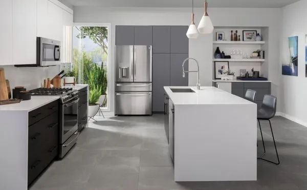 A kitchen featuring GE Profile appliances
