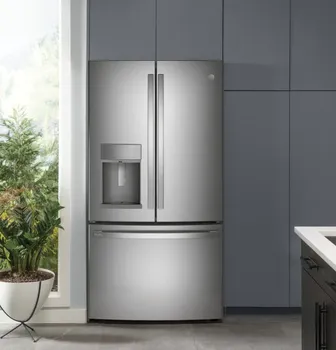 The GE Profile PYE22KYNFS refrigerator in a kitchen 