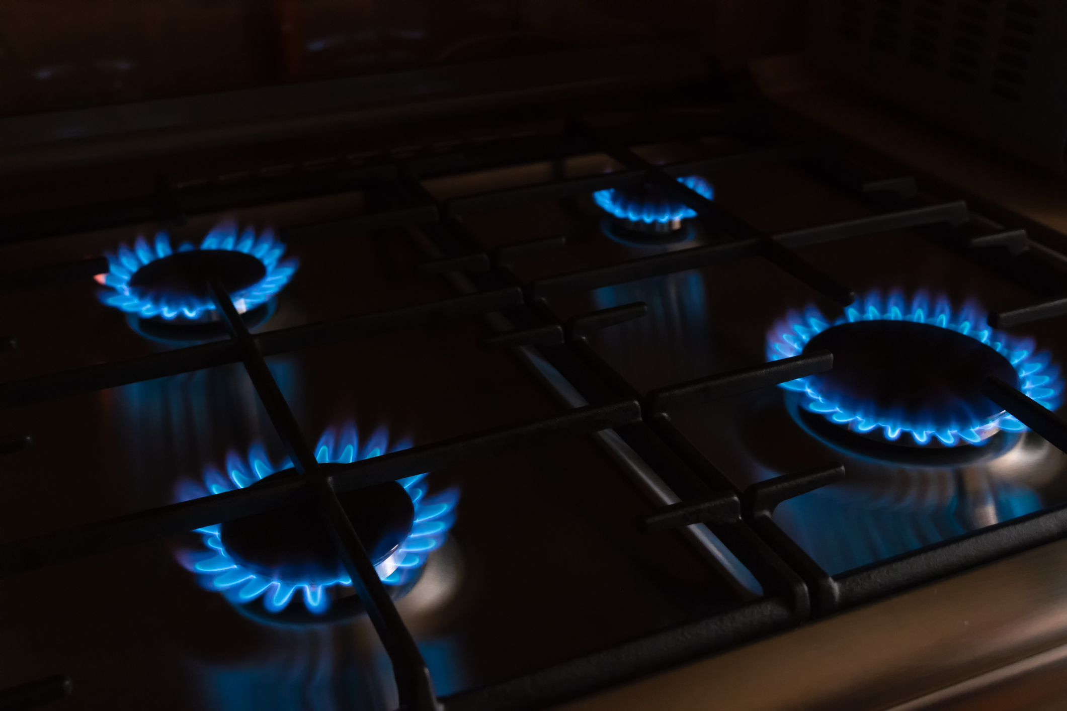 four burning gas burners 