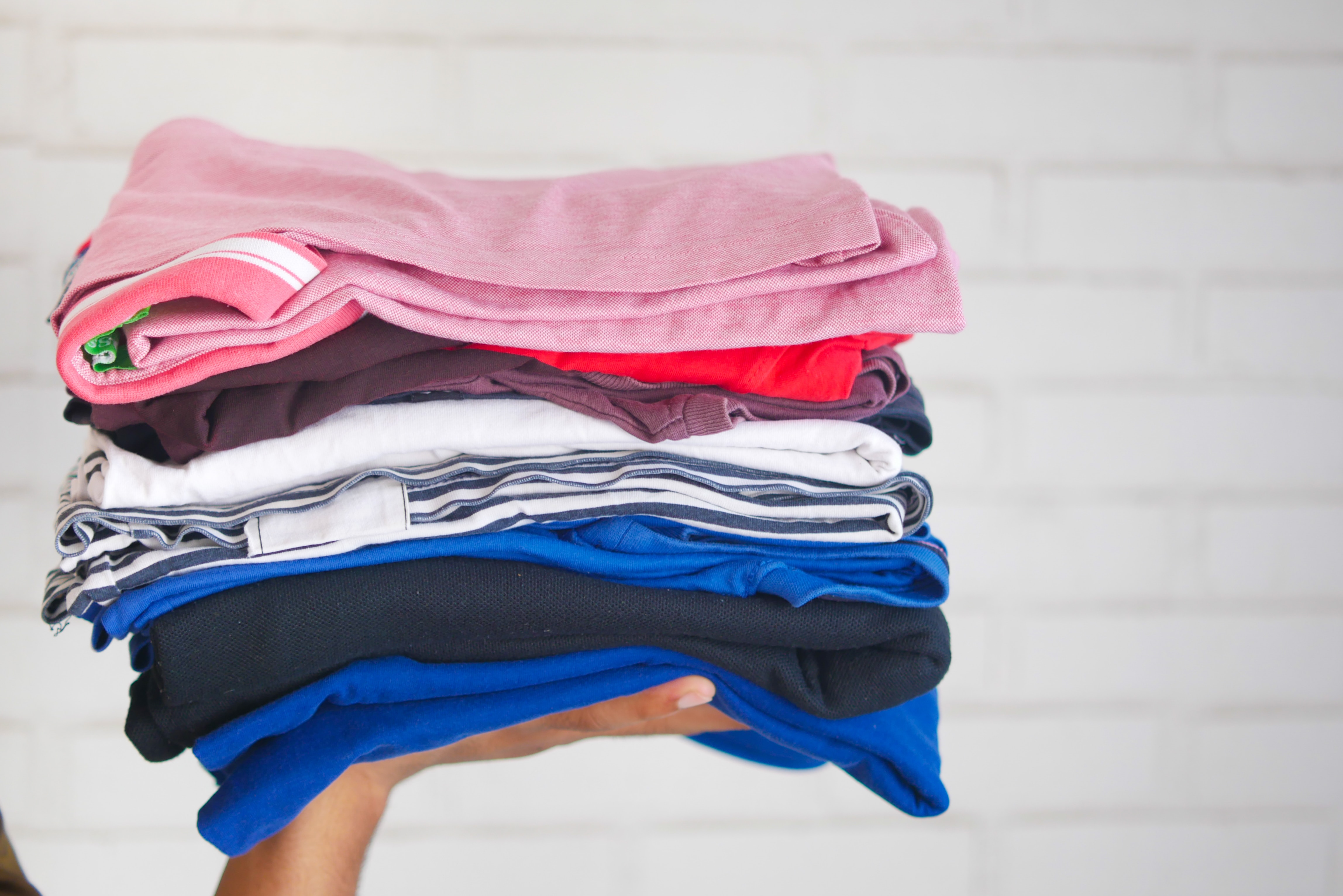 Holding Folded Laundry