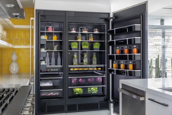 An open JennAir JBZFL24IGX built-in refrigerator