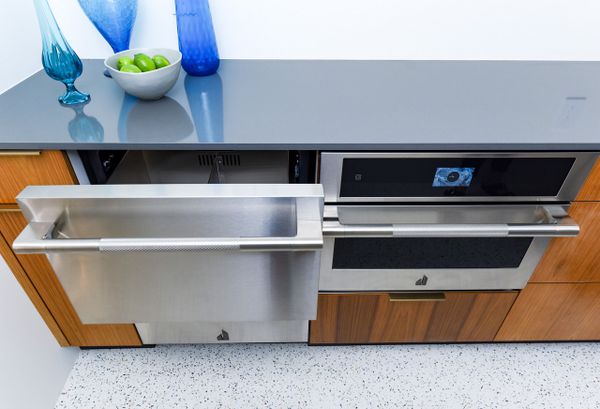 Overhead view of the JennAir JUCFP242HL drawer refrigerator with a matching drawer microwave 