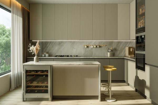 A modern kitchen island with a built-in beverage refrigerator 