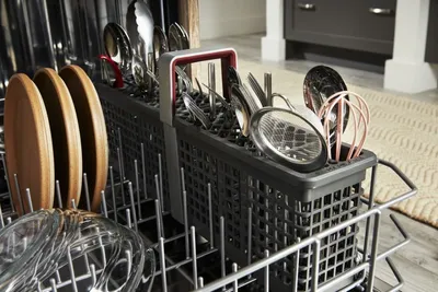 A close-up of dishes inside the KitchenAid KDTS724SPS dishwasher