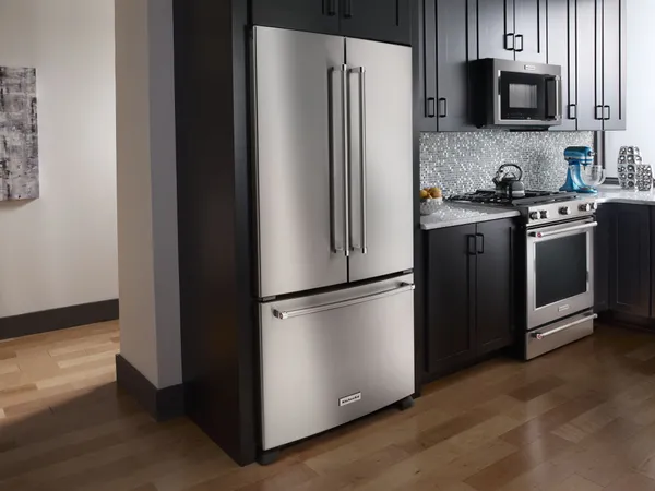 The KitchenAid KRFC302ESS refrigerator in a kitchen