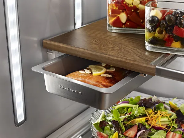 A close-up of produce inside the KitchenAid KRFC704FPS refrigerator interior