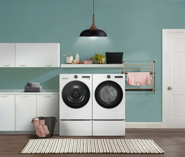 The LG WM5500HWA DLEX5500W laundry pair in a laundry room 