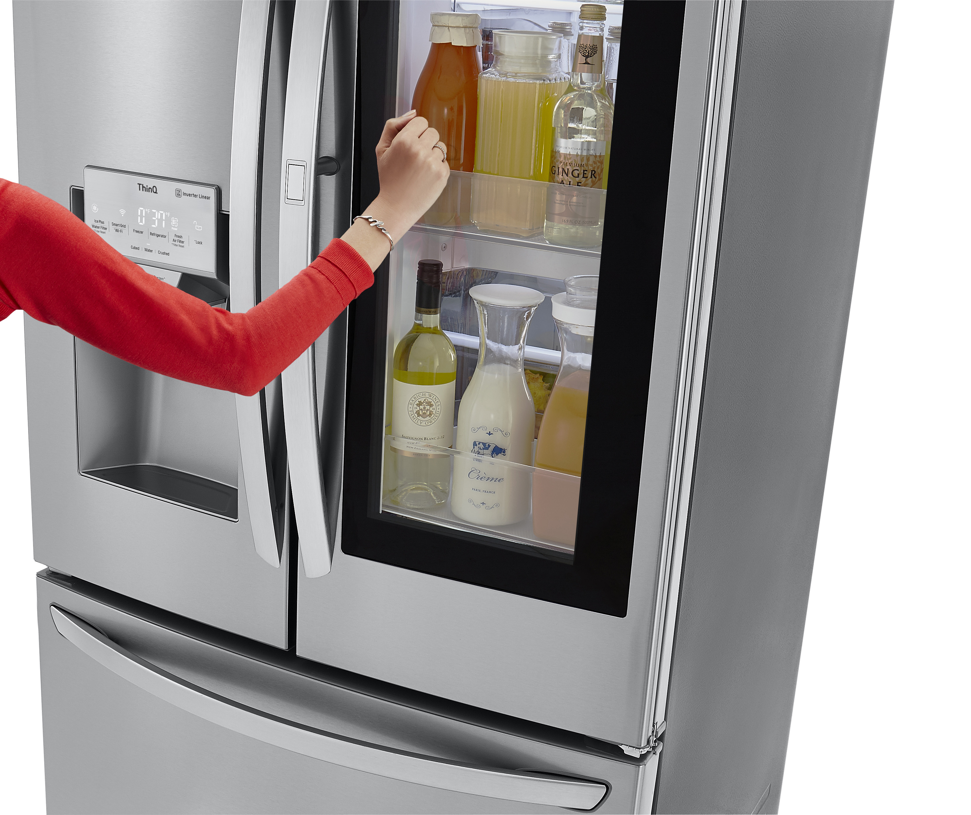 Product image of woman knocking to use LG InstaView Door-in-Door feature on stainless-steel French door refrigerator