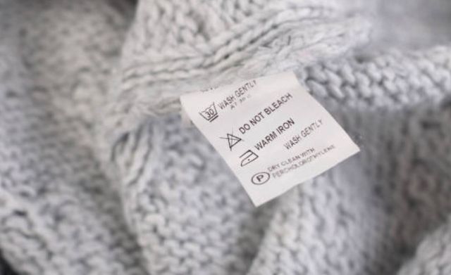 closeup view of a washing label on a wool sweater