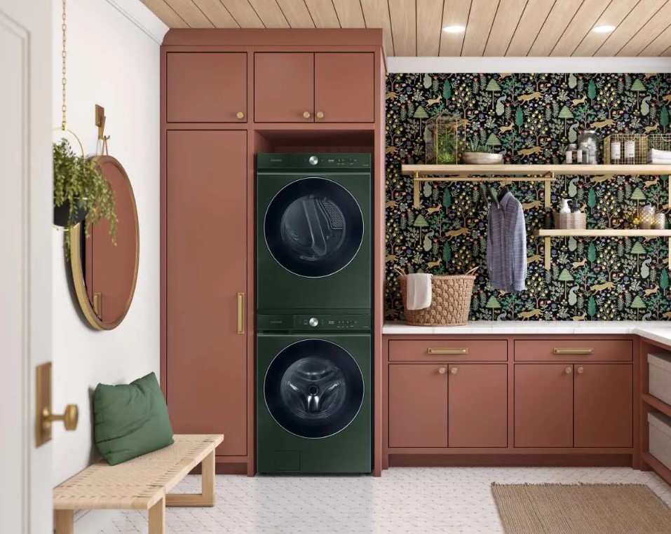 Forest Green Samsung front load washer and dryer stacked in a stylish laundry room