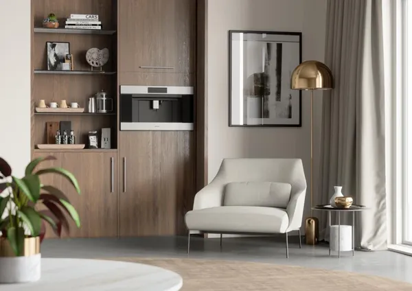The Miele E Series Transitional coffee maker featured in a living room 