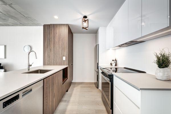 A straight view into a modern galley kitchen layout 
