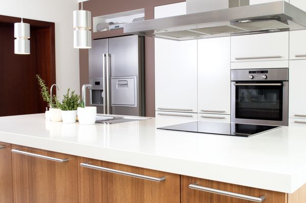A modern kitchen featuring a variety of appliances 