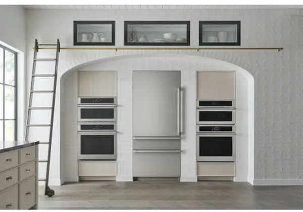 The Monogram ZIC363NBVRH bottom freezer refrigerator in an upscale kitchen 