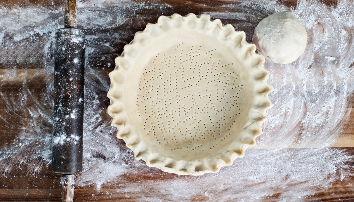 Pie crust just rolled out into a pan