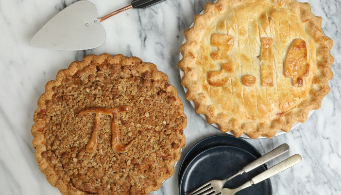 Closeup of pies with the Pi number and symbols