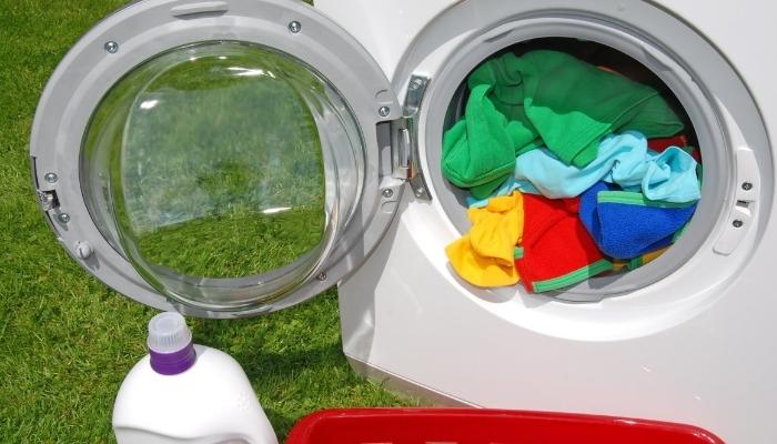 Open washer outside on grass