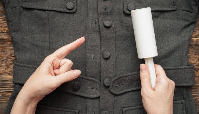 Hand brushing winter coat