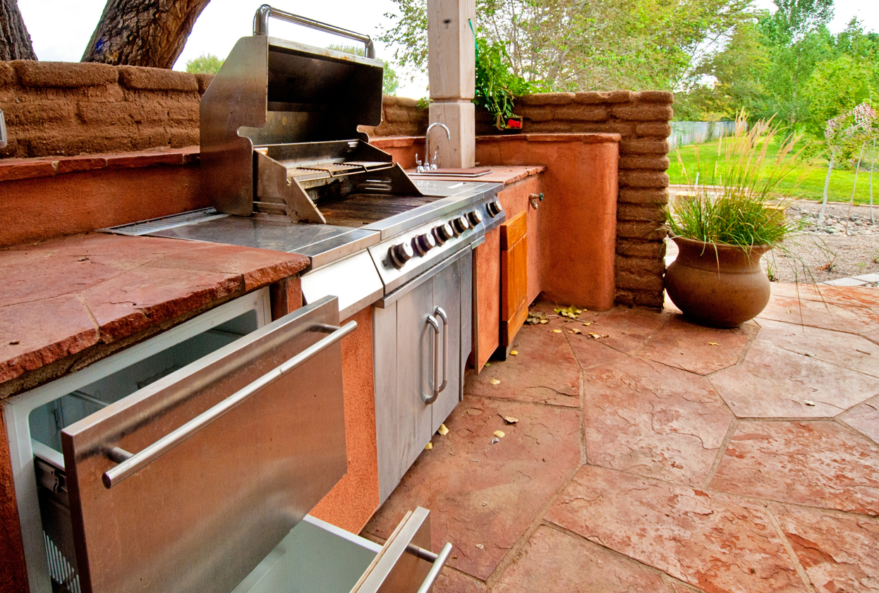 stone and terracotta outdoor kitchen 