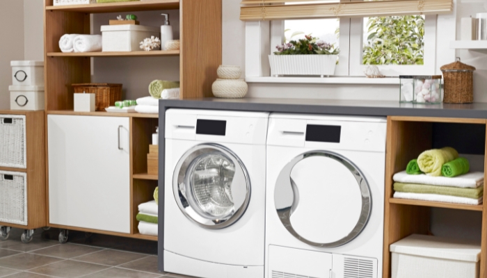 Laundry room with counter over appliances