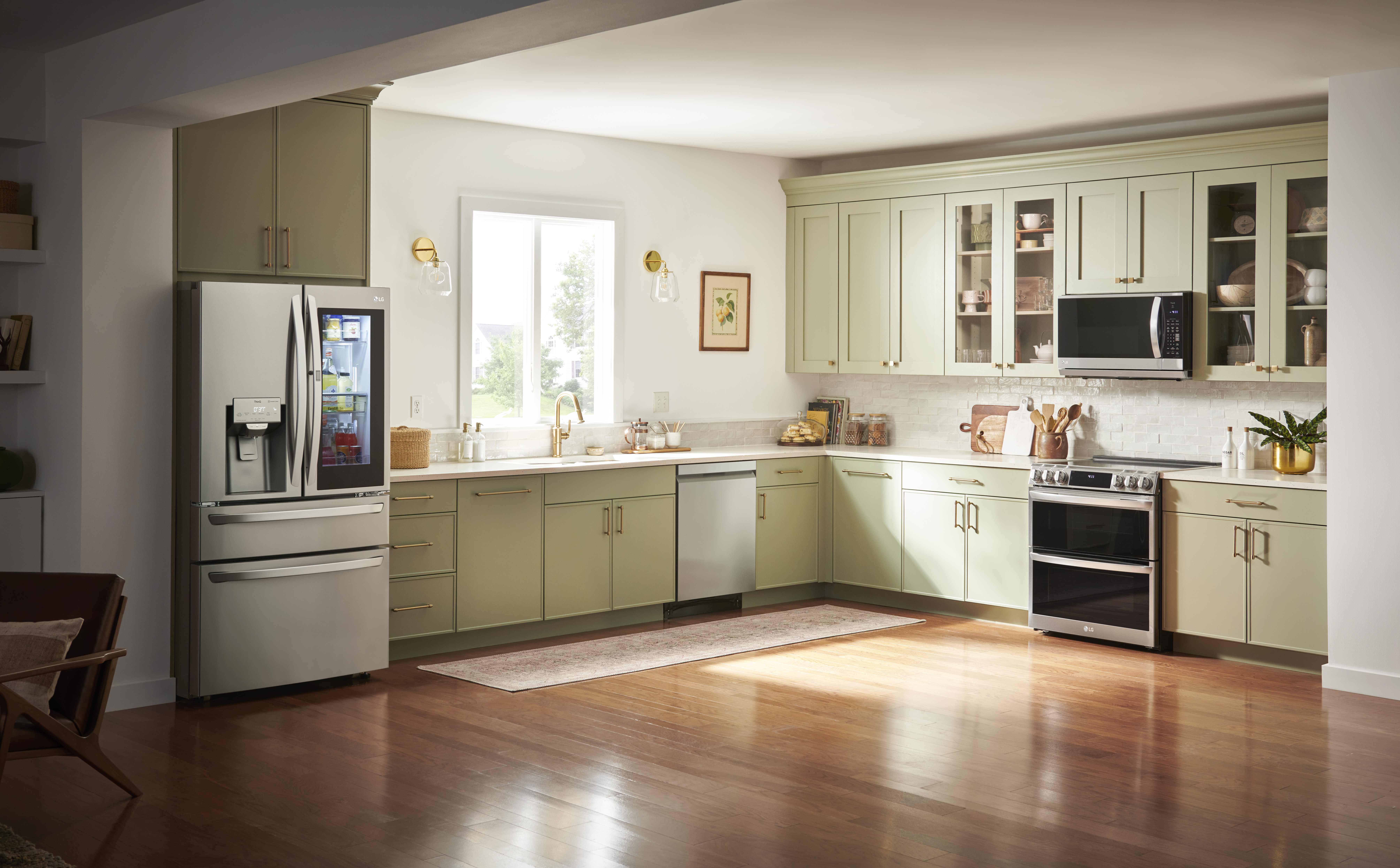 green kitchen with LG appliances