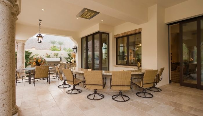 armchairs at bar area on home patio