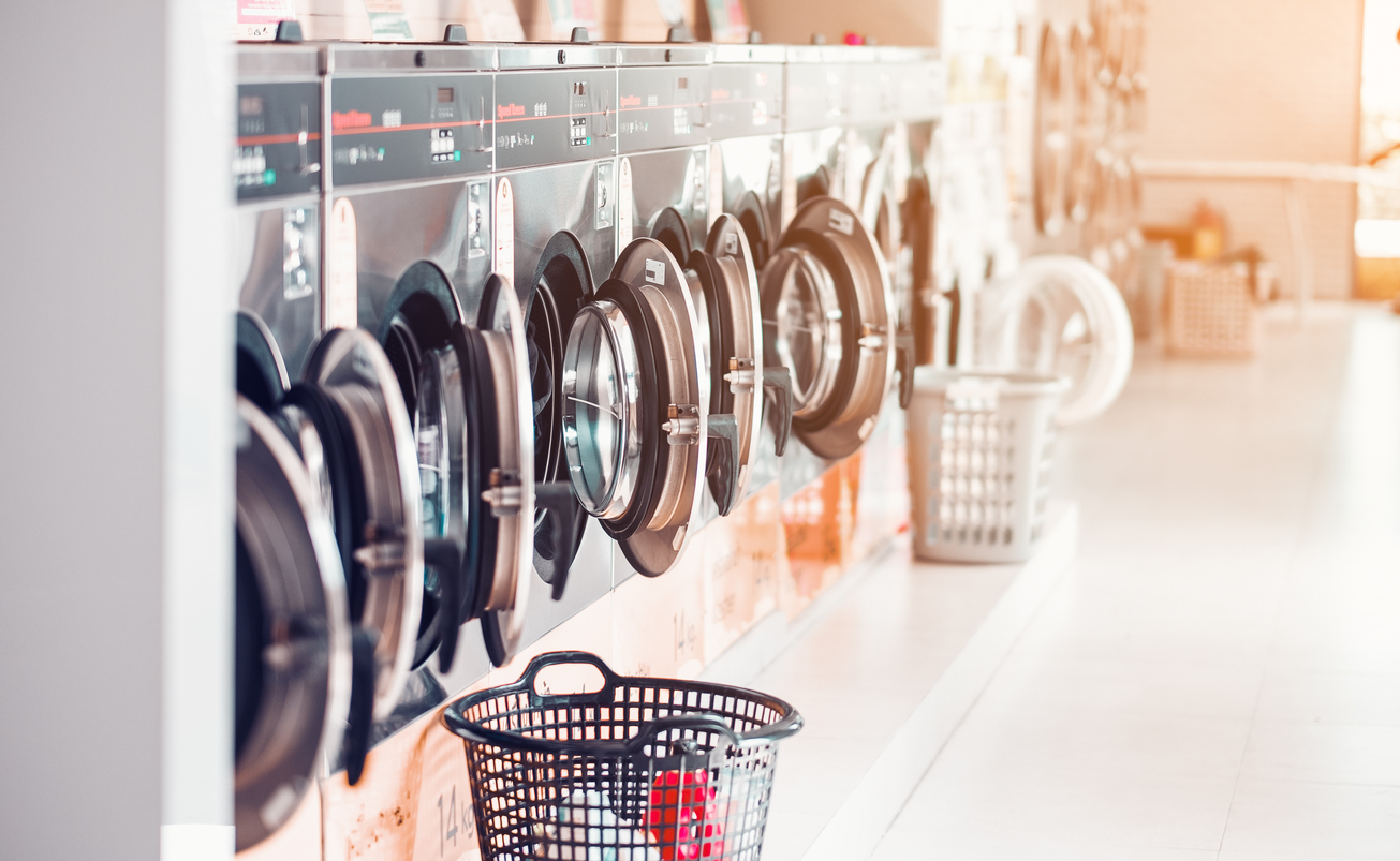 laundry mat with open washer doors