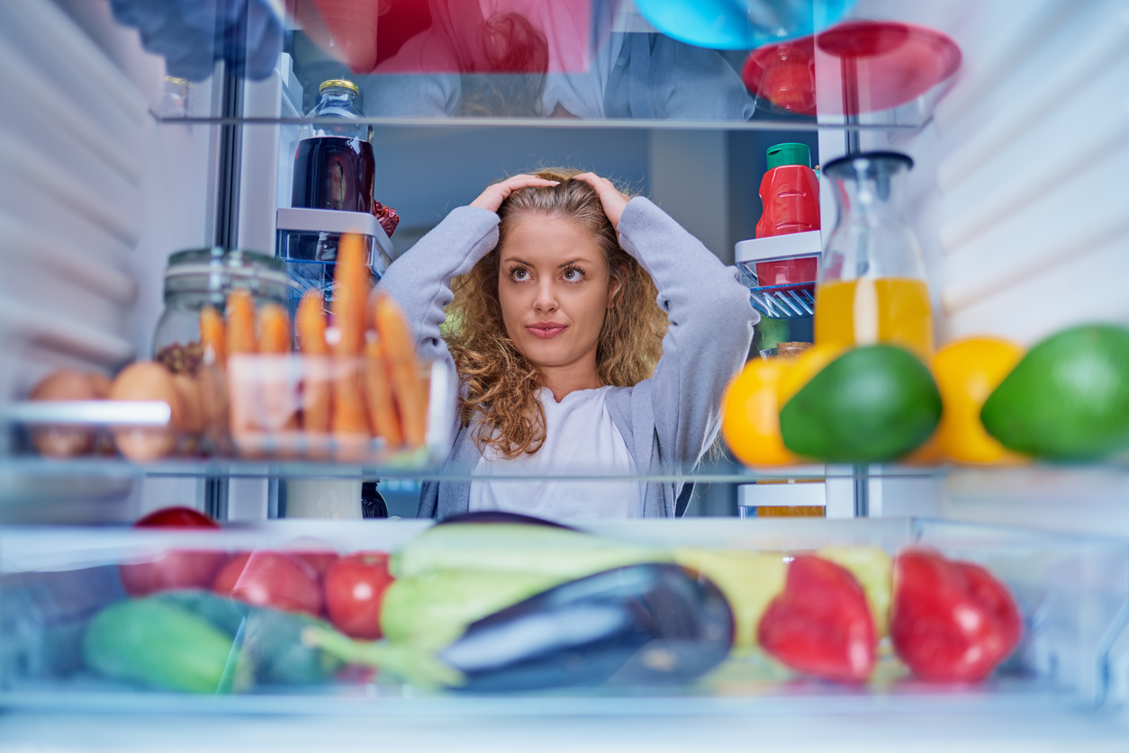 lady looking frustrated with organizing