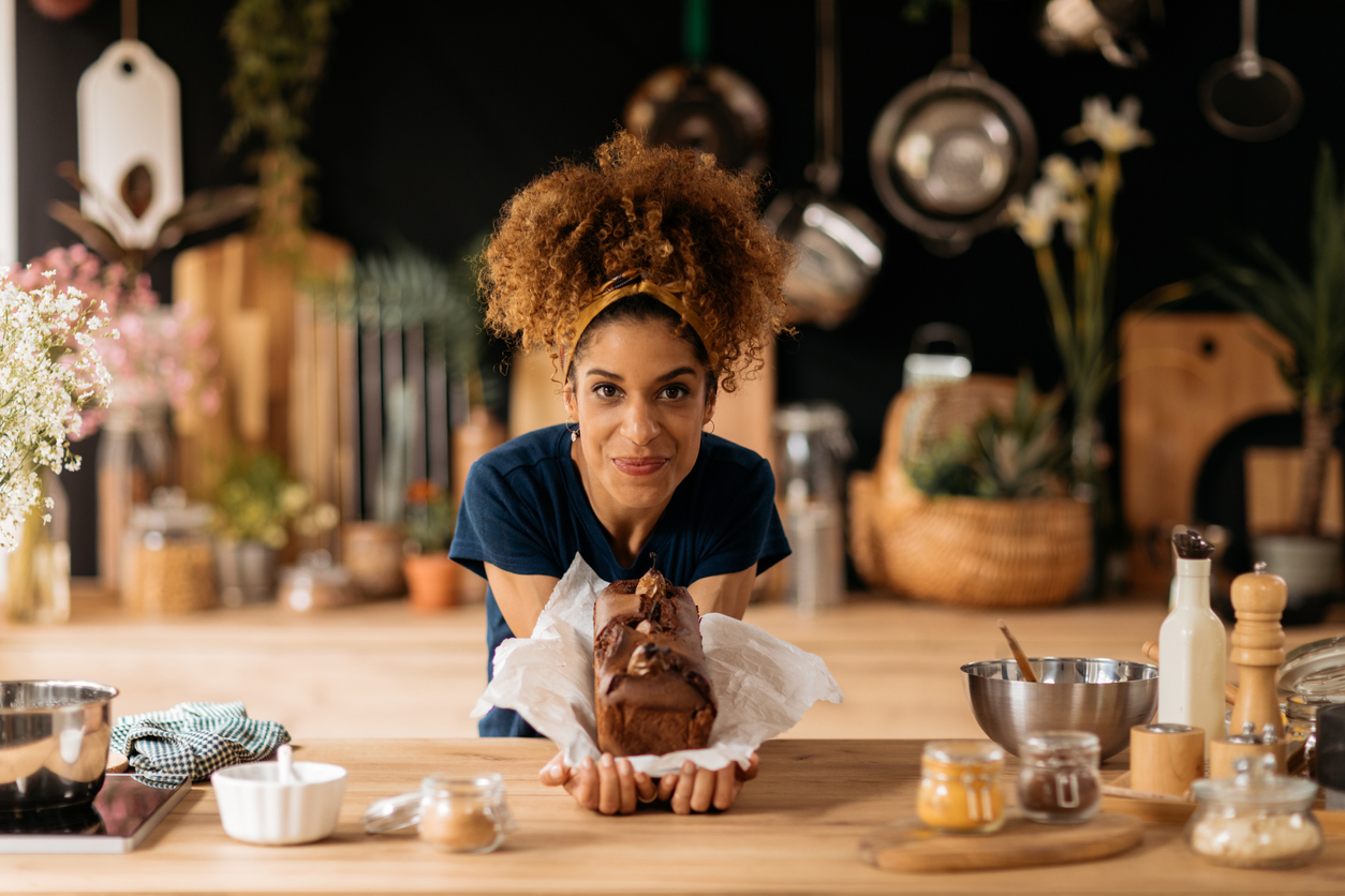Woman showing off her baking materials
