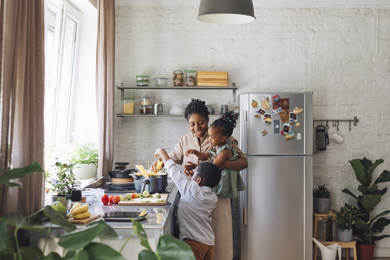 Family Cooking on Stove