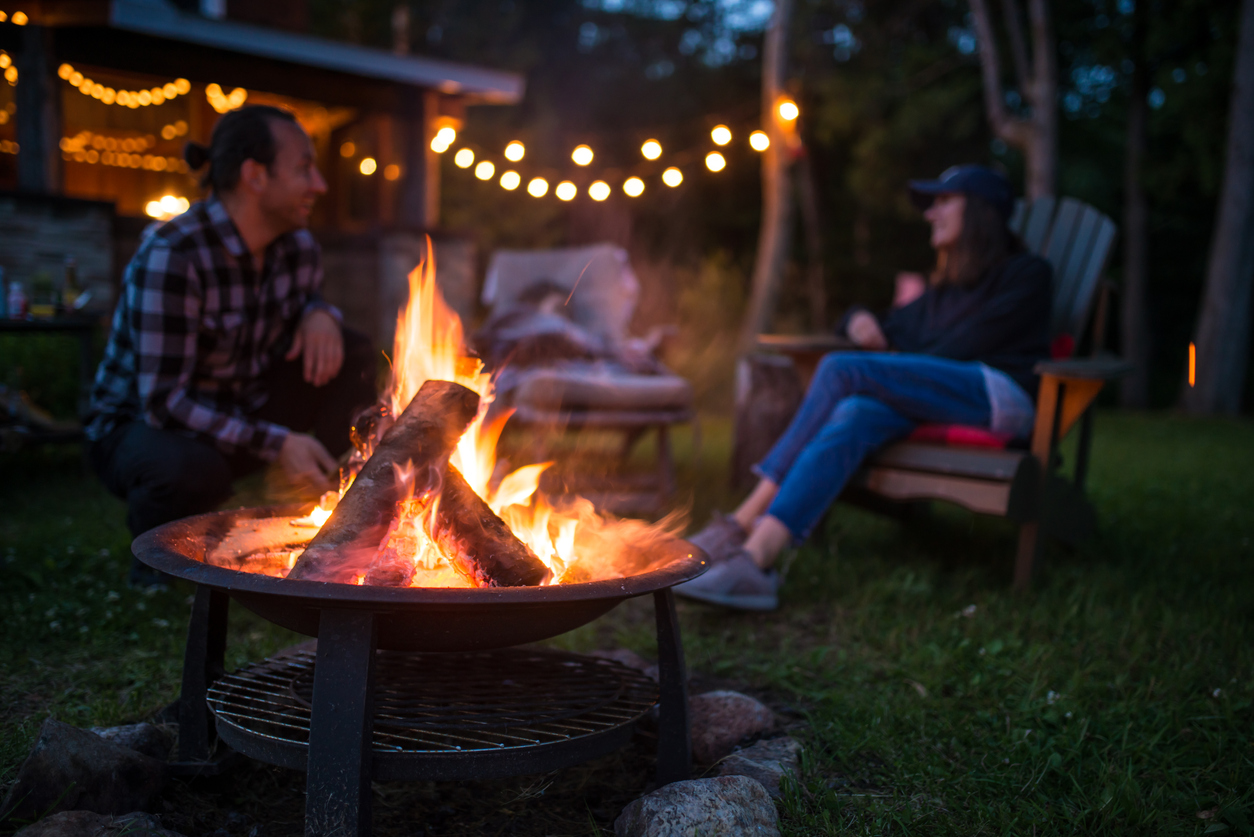 sitting by a fire