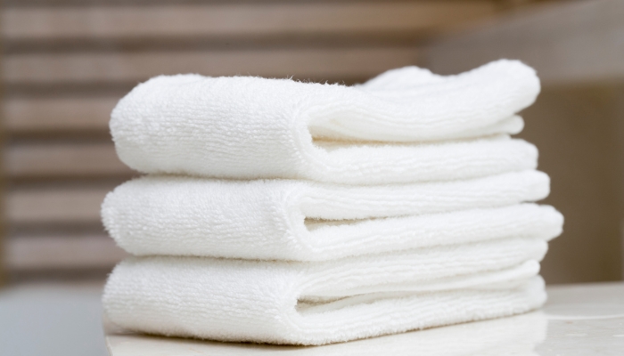 A stack of folded cotton towels