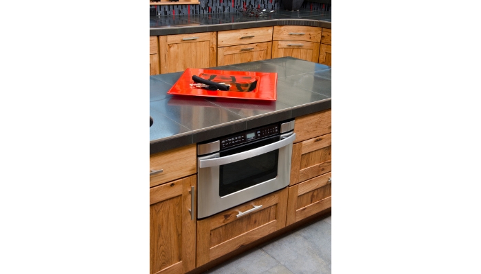 Microwave drawer installed underneath countertop for easier access