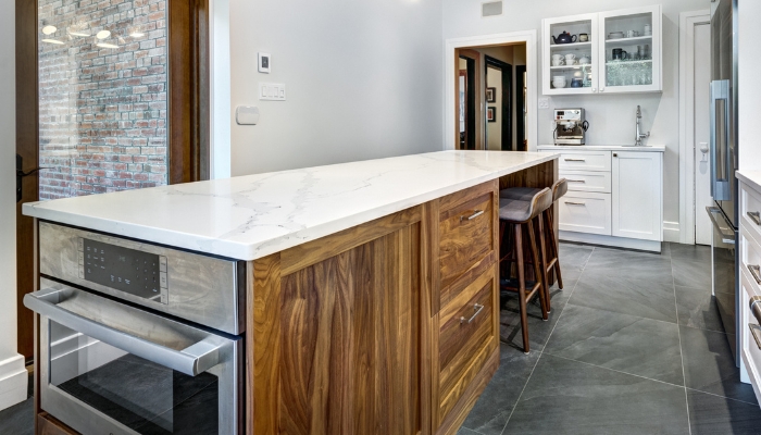 Modern, sleek kitchen with a microwave drawer