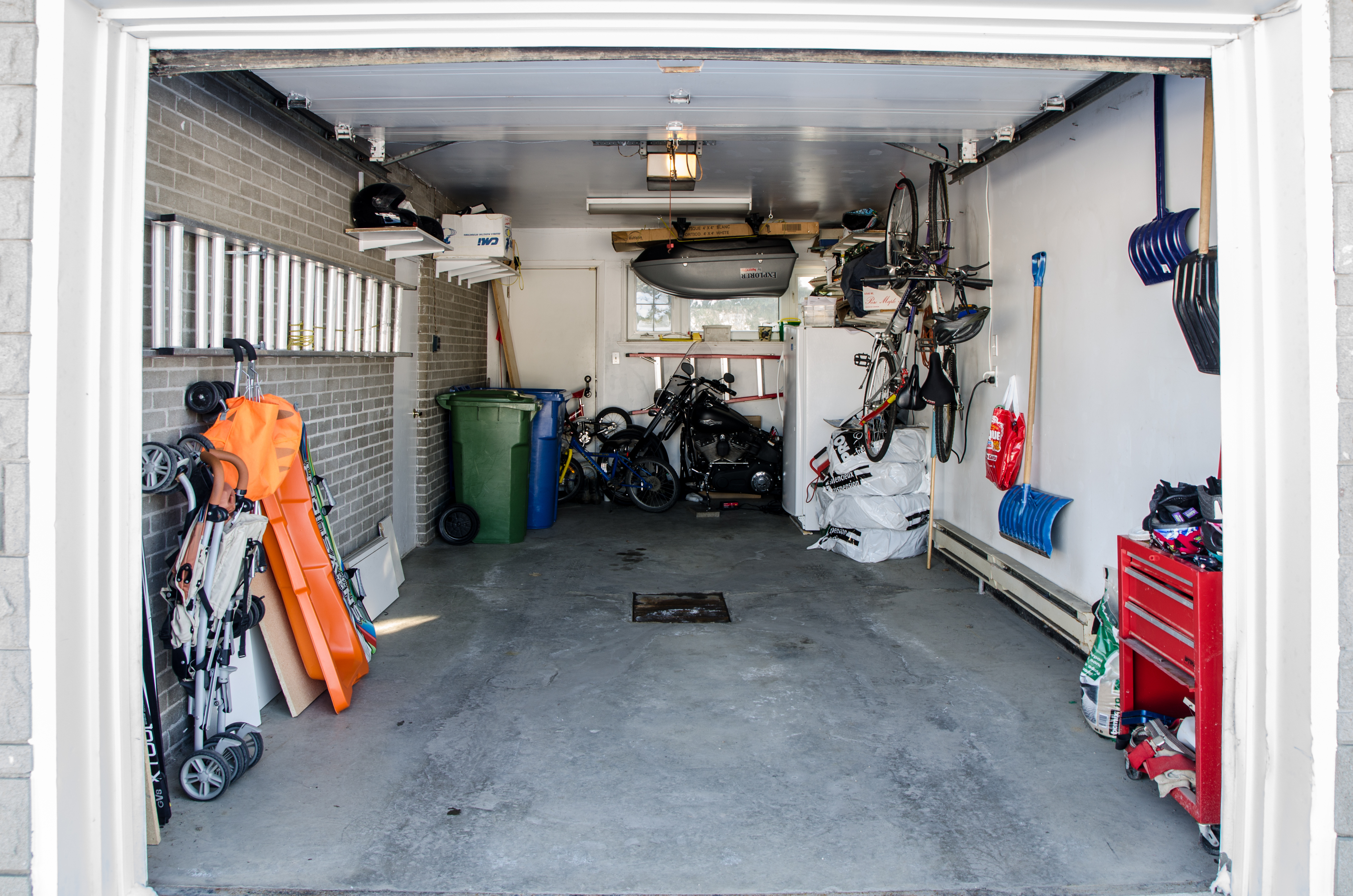 fridge in a clutter garage