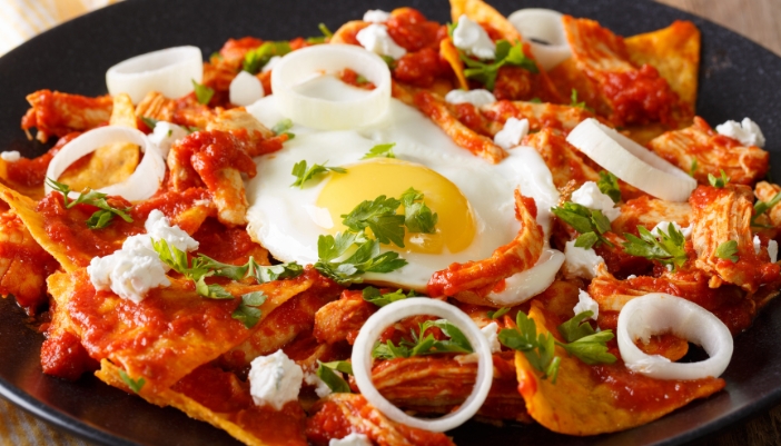 Chilaquiles rojos with fried eggs