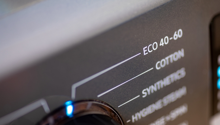 Closeup of eco settings on a washer