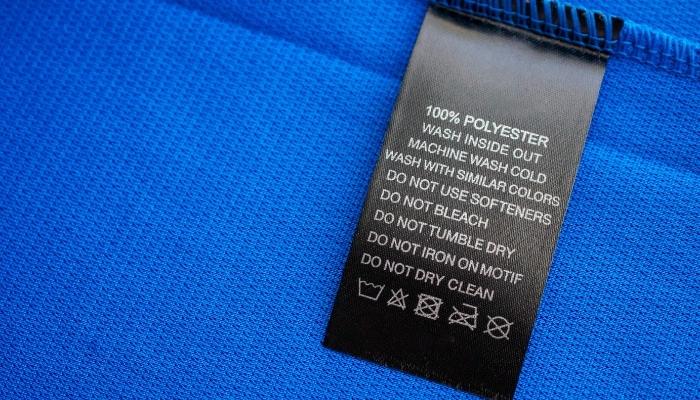 Clothes tag describing to put clothes inside out