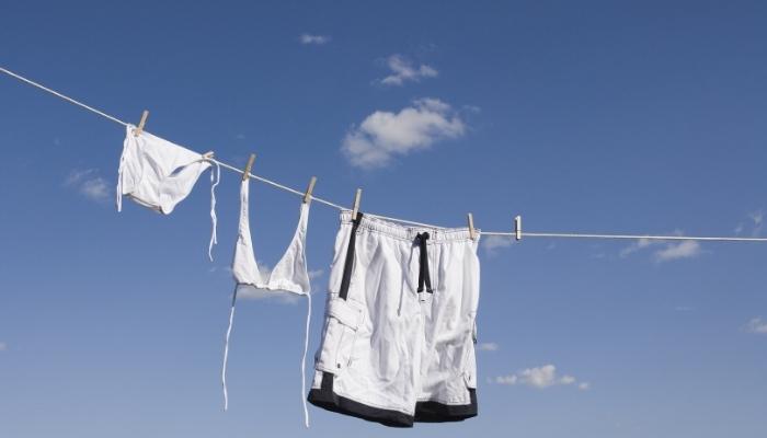 Swimsuits hanging on a line to dry