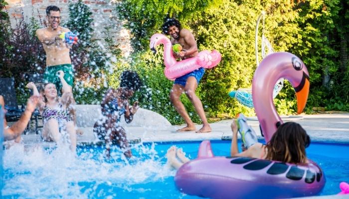 Group of people having fun at the pool