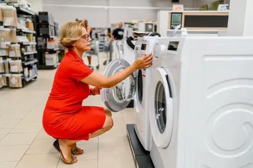 Woman Shopping for Washing Machine