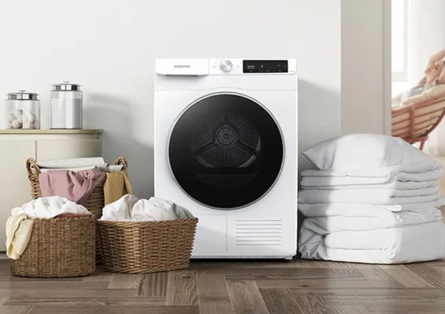 samsung dryer stylized with baskets and towels in a laundry room