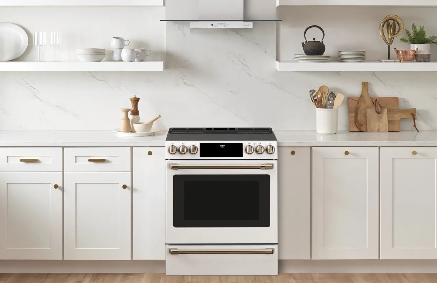 white kitchen with white cafe slide in electric range