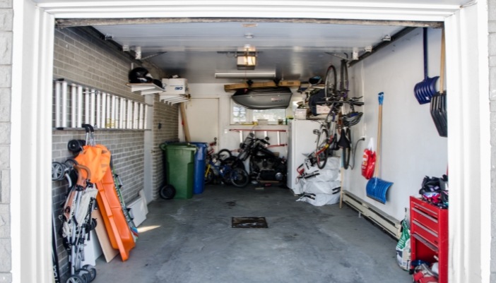 An upright freezer in a garage