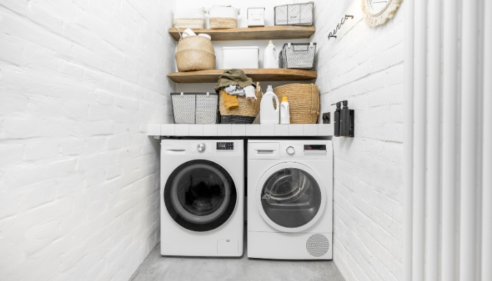 A laundry pair in a narrow laundry space